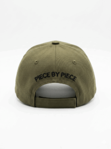 Piece by Piece Navy Green Cap Back